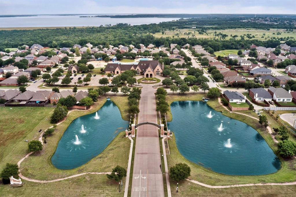 Aerial perspective showcasing a residential community with two prominent water features