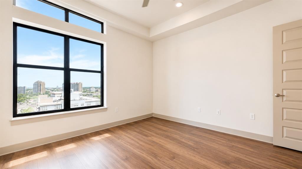 Expansive window framing cityscape