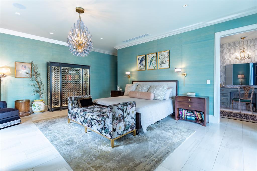 Oversized Primary Bedroom with designer wallcovering & ensuite Bath.