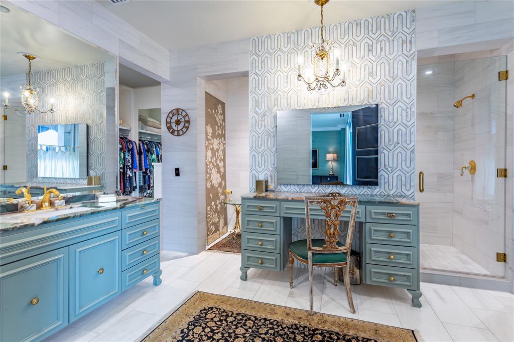 Custom enamel cabinets & make-up desk with TV in the mirror.