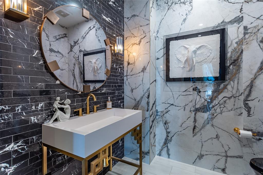 Custom Sink in the marble Powder Room.
