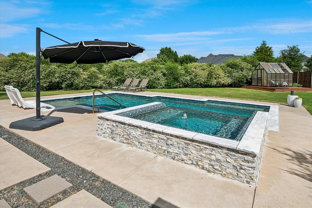 Beautiful pool with raised spa