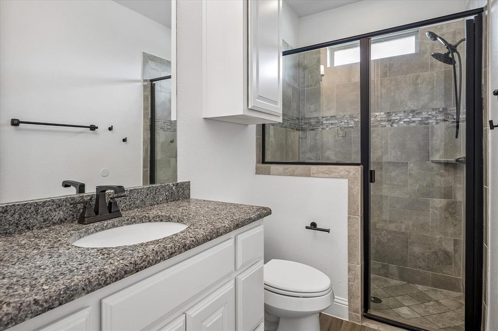 Bathroom has walk-in shower