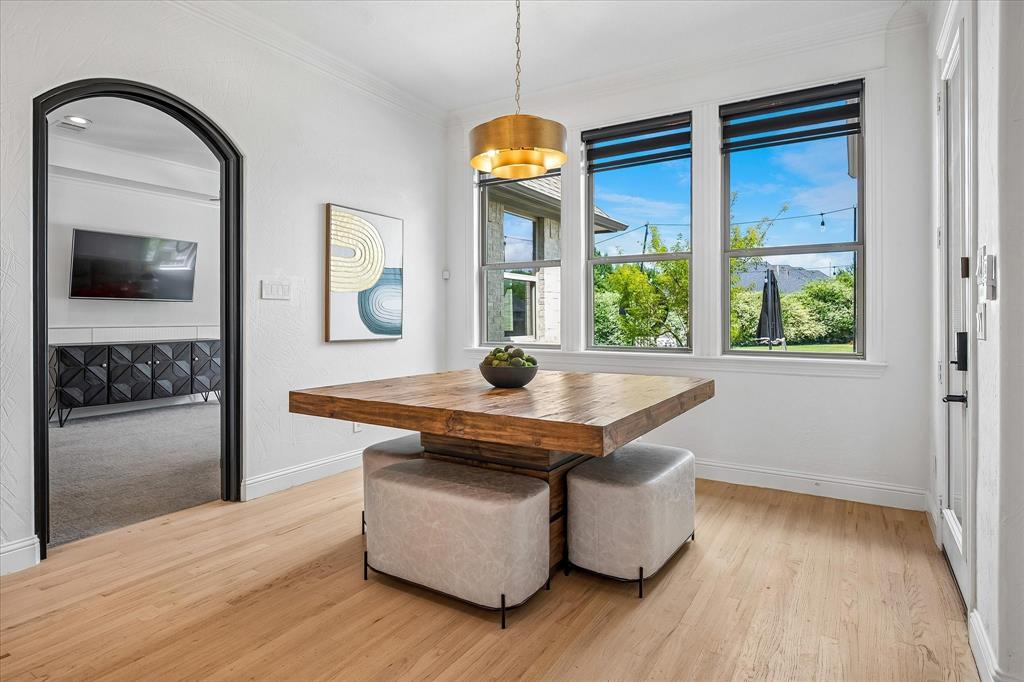Breakfast nook overlooks beautiful pool and spa.