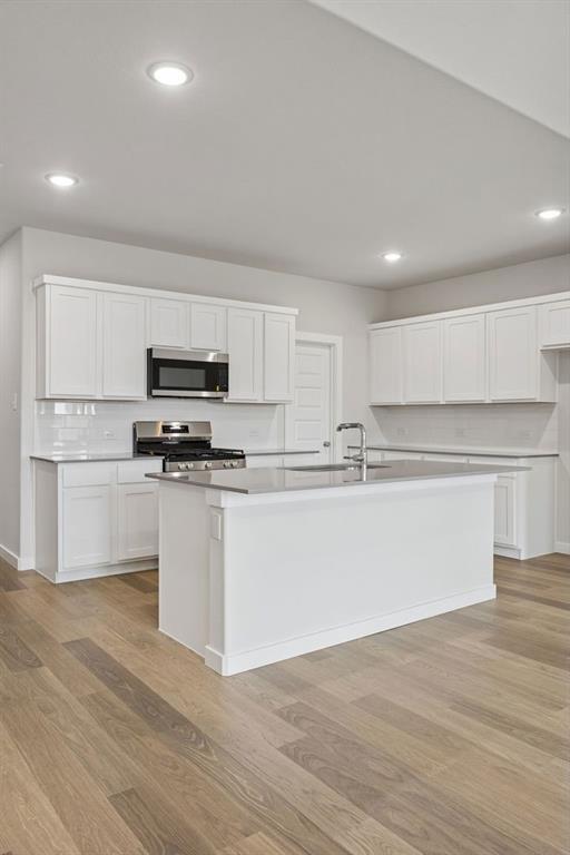Kitchen in the Masters home plan by Trophy Signature Homes – REPRESENTATIVE PHOTO