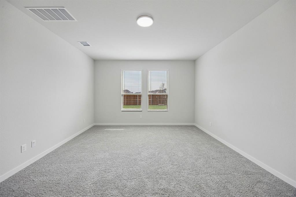 Primary Suite in the Masters home plan by Trophy Signature Homes – REPRESENTATIVE PHOTO