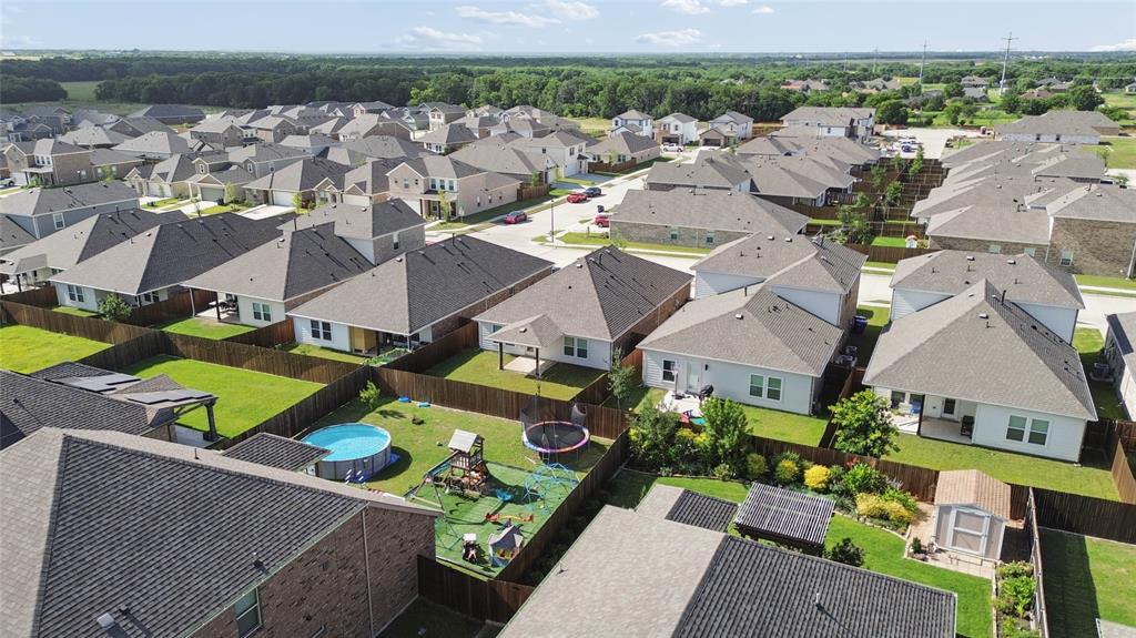 Neighborhood of single-family residences with fenced backyards