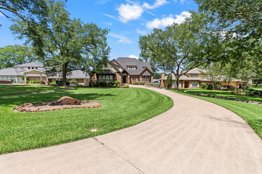Long winding driveway offering privacy and ample parking.
