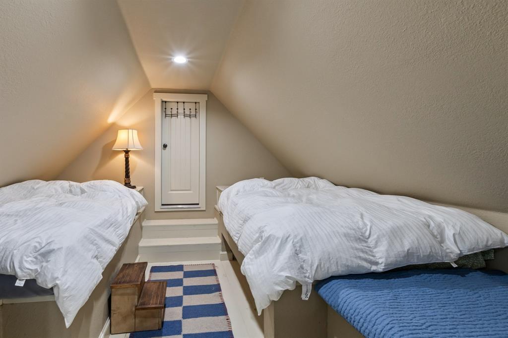 Built in Bunk Room with doorway to attic access with opportunity to expand or also makes storage.