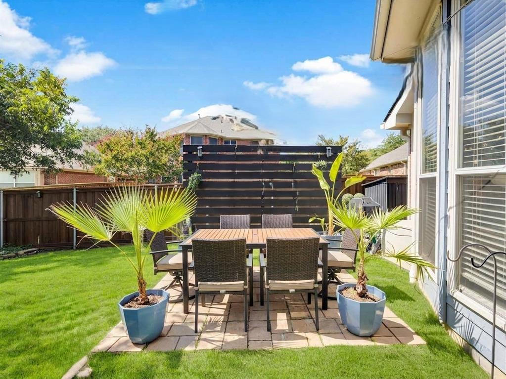 Virtual rendering with patio set instead of hot tub.