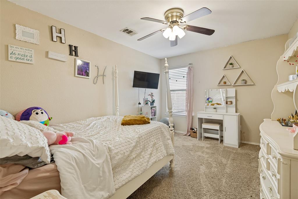 Carpeted interior space featuring neutral wall tones