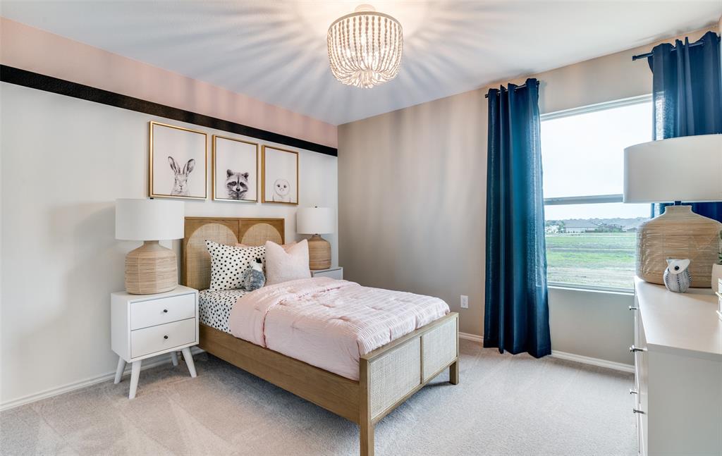 *Model Representation - Spacious secondary bedroom with large windows