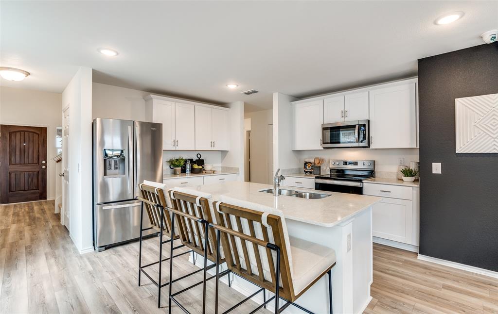 *Model Representation - Spacious kitchen with eat-in bartop island *Model Representation - Spacious kitchen with eat-in bartop island