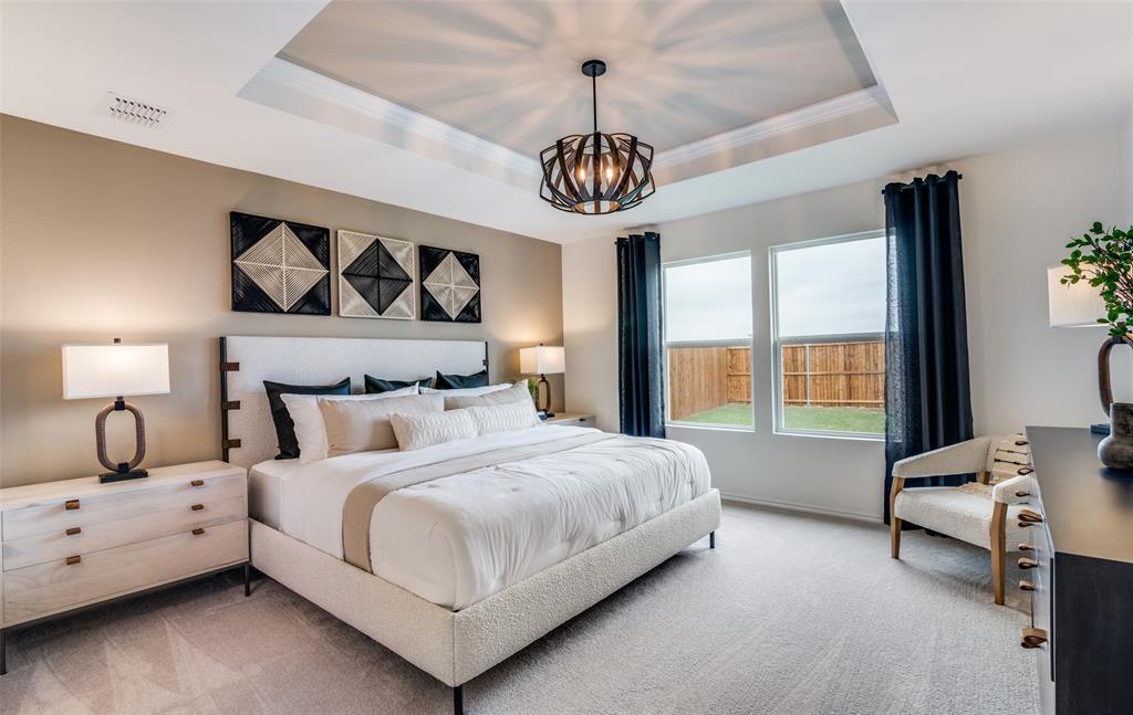 *Model Representation - Spacious owner's suite with private bath