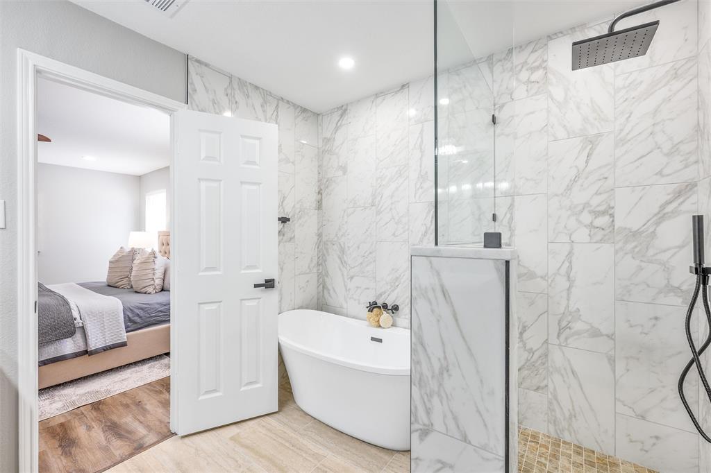 Oversized shower with seat and built in shampoo shelf