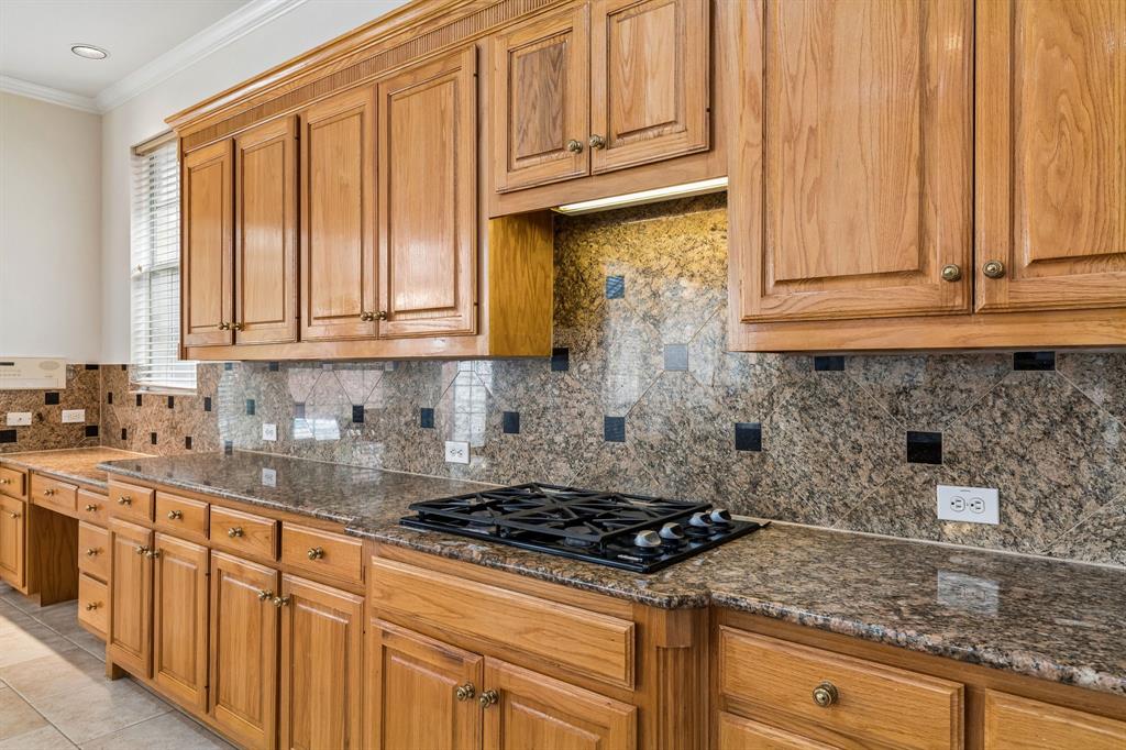 With generous countertops throughout, this home is a dream for the baking enthusiast in the family. Imagine the joy of rolling out an abundance of cookie dough with friends or the little ones in your life, creating cherished moments in this fun and inviting space.