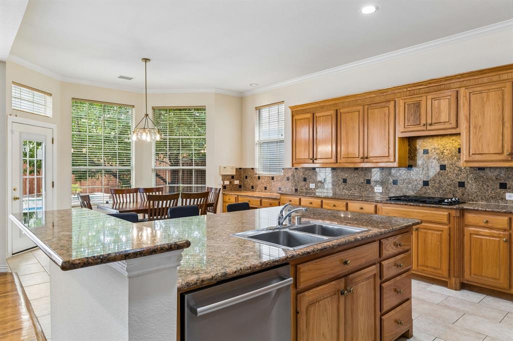 Kitchens are definitely the heart of the home! Cook for two or twenty in this stylish well-appointed kitchen. Beautiful cabinetry provide plenty of storage in this gourmet kitchen.