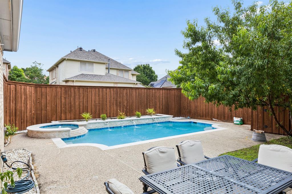 The sparkling pool creates the perfect setting for relaxing weekends, entertaining guests, and enjoying Texas summers in style.