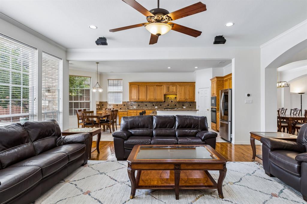 A picture's worth a thousand words! Living is easy in this impressive, generously spacious home. Natural light with floor to ceiling windows and an open concept unifying your living area and kitchen.