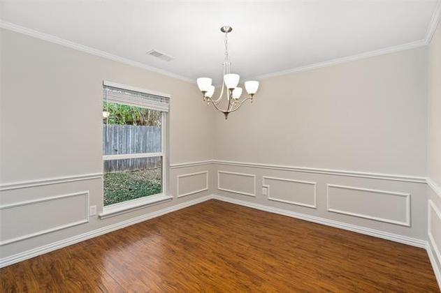 Spacious dining room will hold the entire gang.