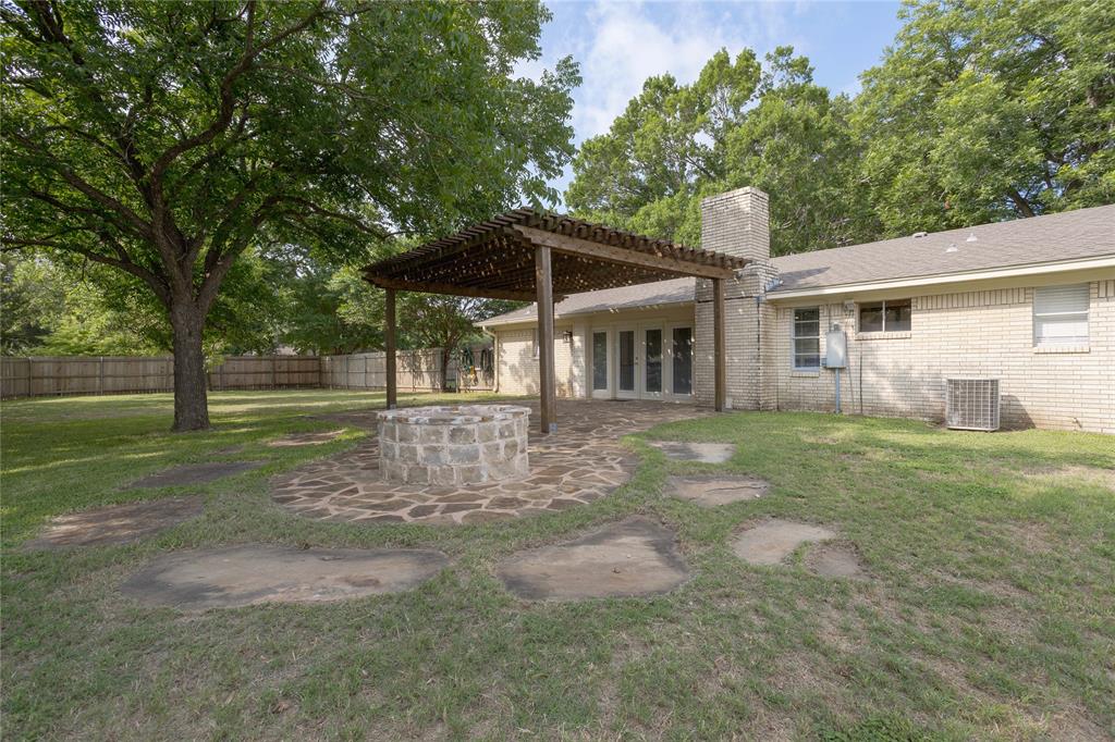 Great outdoor living space, with a built in firepit.