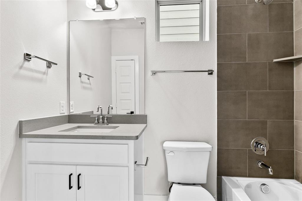 Full bath on first level across from flex room or beddroom Full bath on first level across from flex room or beddroom