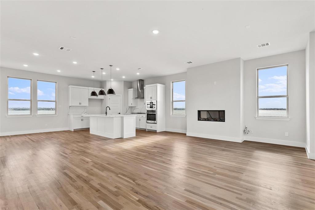 Expansive living area.Luxury wood like flooring Expansive living area.Luxury wood like flooring