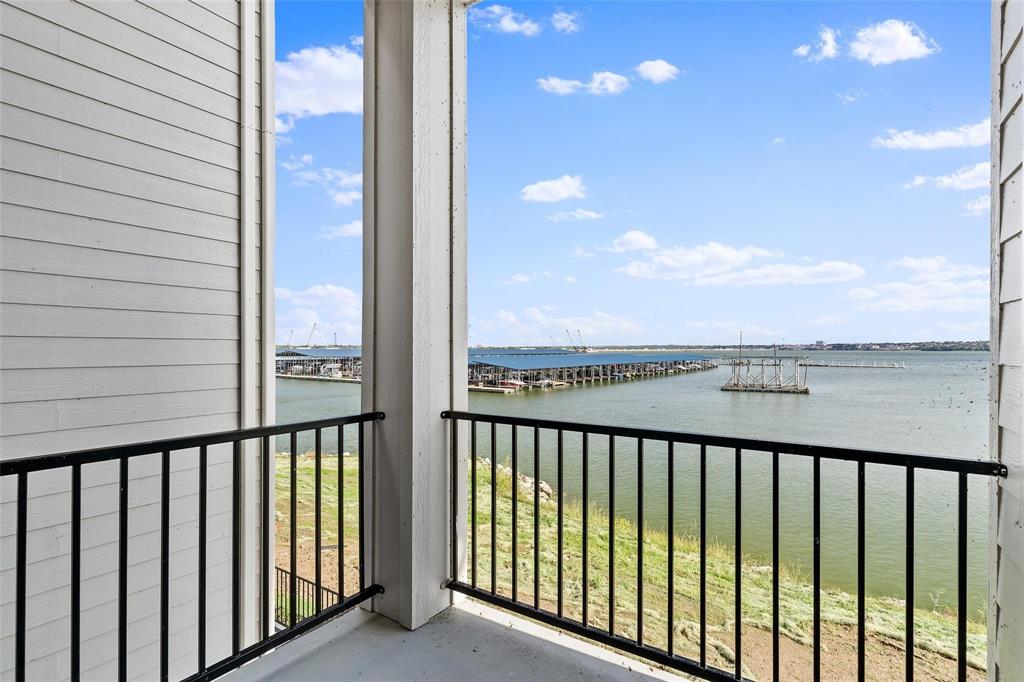 Covered patio off kitchen breakfast area - great lake views