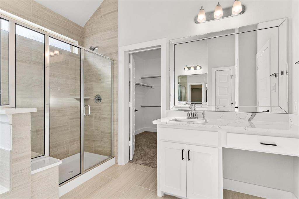 Dual vanities, oversized walk in shower
