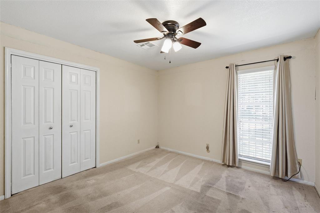 Neutral-toned interior with carpet flooring
