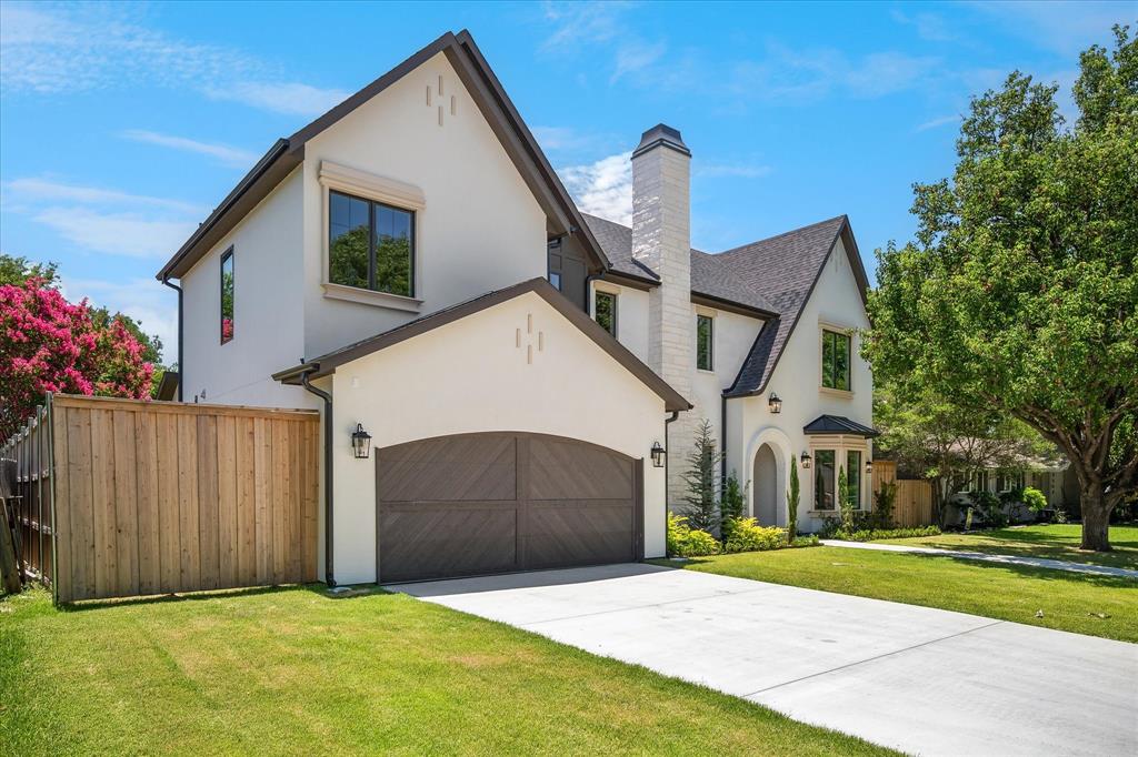 Garage elevation, board and batten gable, concrete drive Garage elevation, board and batten gable, concrete drive