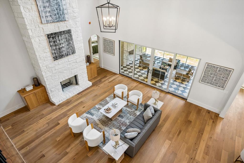 Living room bird's eye, open to kitchen, patio access