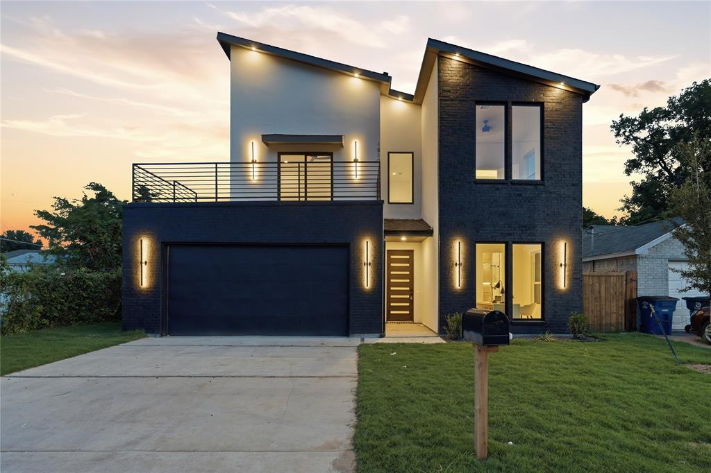 Contemporary two-story exterior with a striking contrasting facade Contemporary two-story exterior with a striking contrasting facade