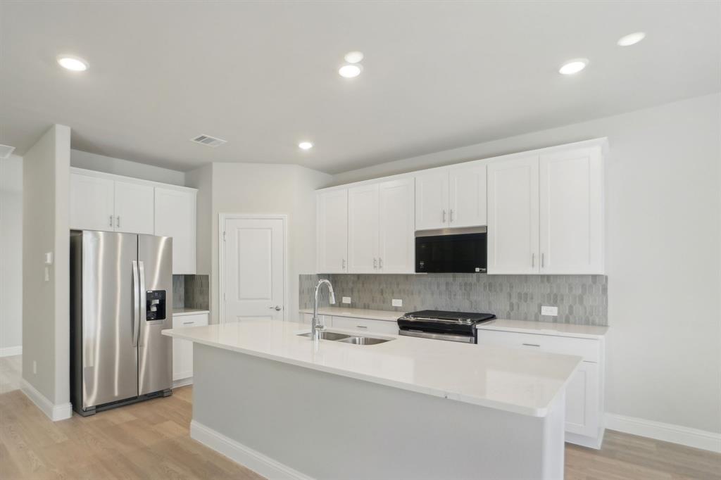 Photo is not of the actual home, but is an inspirational photo of builder’s model home and may depict options, furnishings, and/or decorator features that are not included.