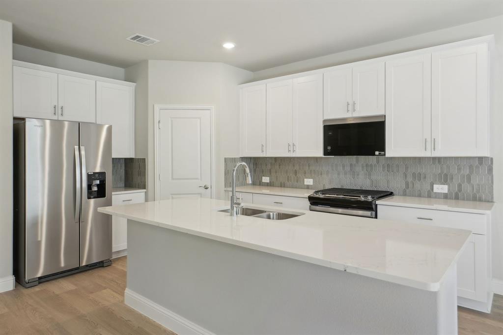 Photo is not of the actual home, but is an inspirational photo of builder’s model home and may depict options, furnishings, and/or decorator features that are not included.