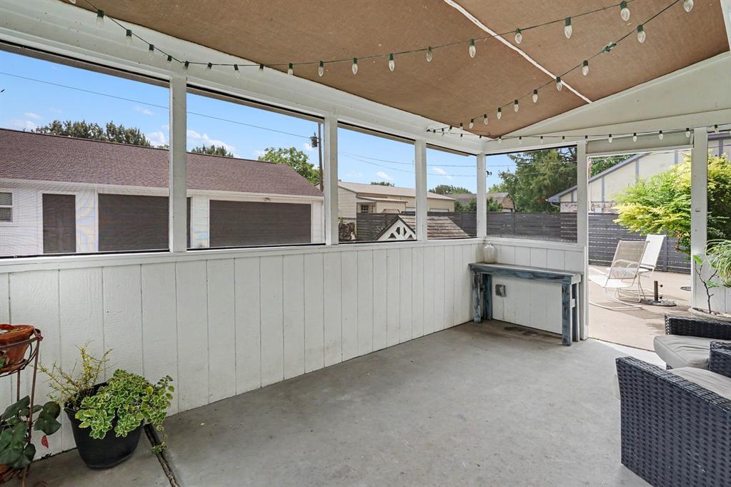 Open air, screened porch off of the kitchen.