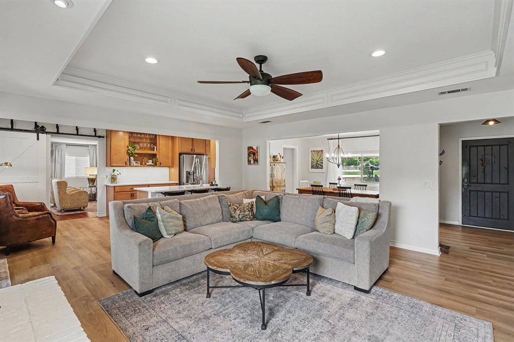 Open and spacious Living Room opens to the Kitchen and Dining room.