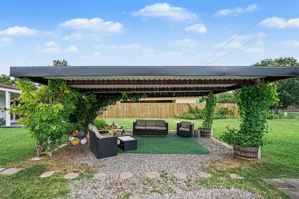 Covered carport or outdoor sitting area