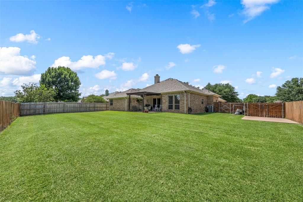 Expansive green lawn providing abundant outdoor space