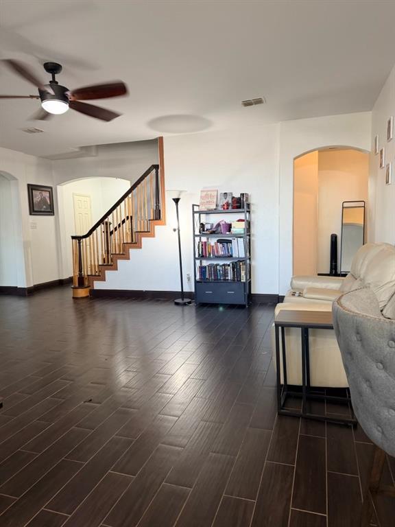 Wood-finish plank flooring throughout the main living area