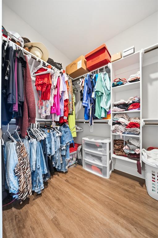 Customizable closet system with wood-finish flooring