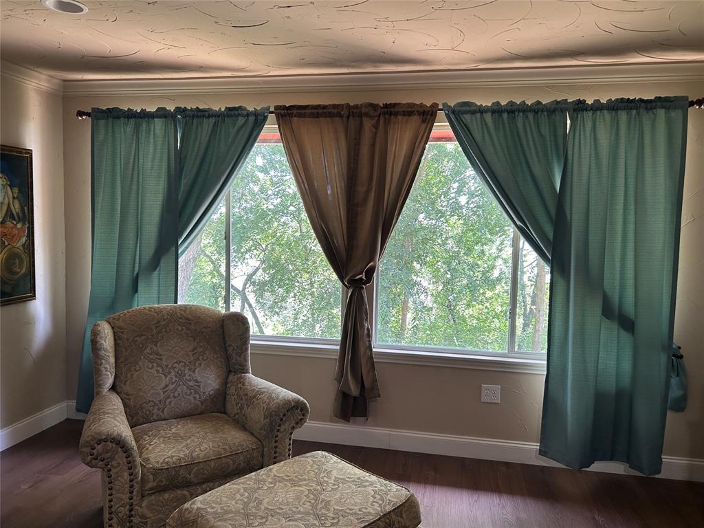 in primary bedroom with view to lake
