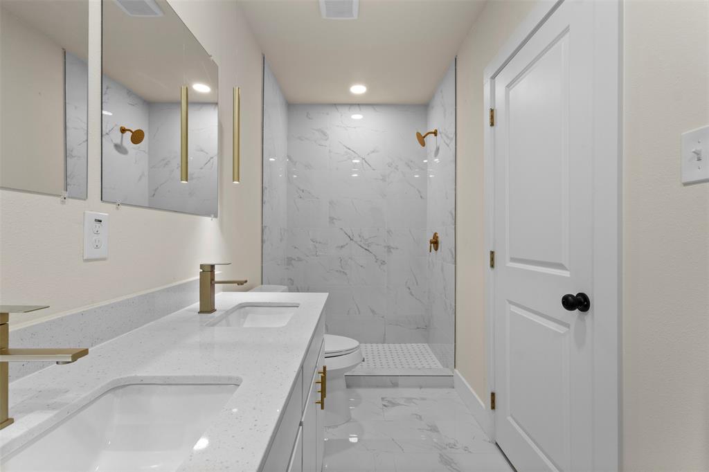 Dual under-mount sinks with quartz-finish countertop