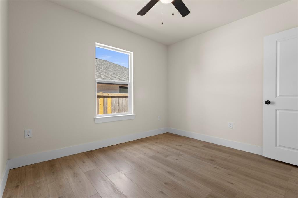 Wood-finish flooring with white trim