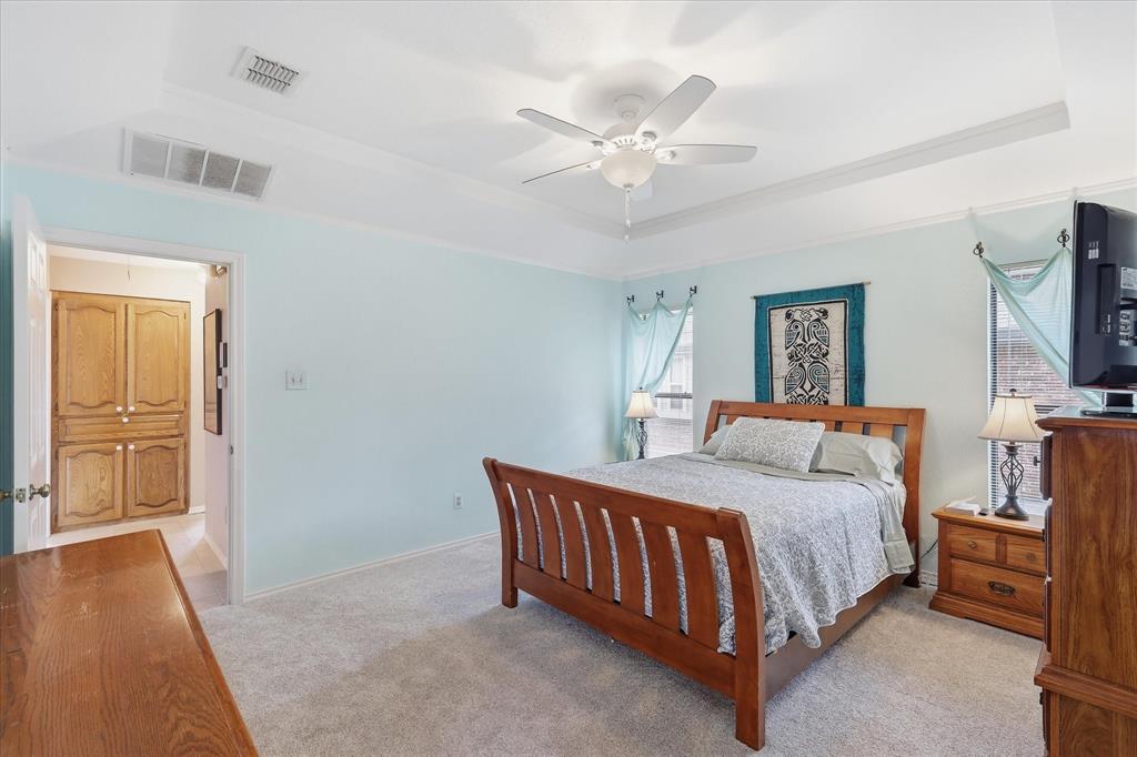 Another look at the primary bedroom.  Notice the linen closet in the hallway to the primary.