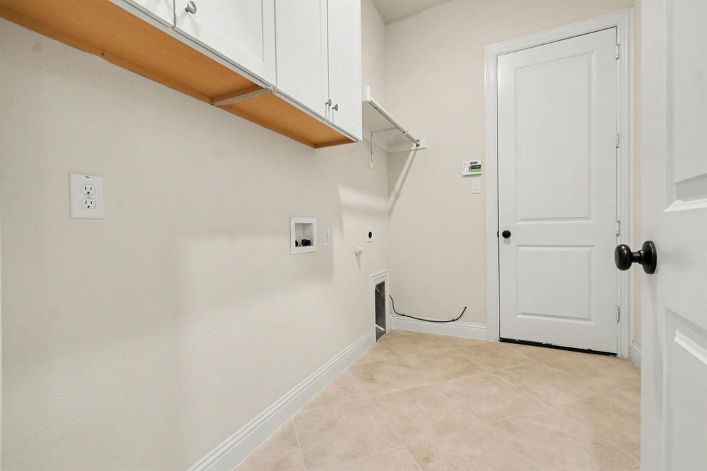 Laundry Room w built in cabinets