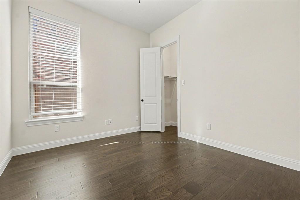 Spacious Primary with hardwoods