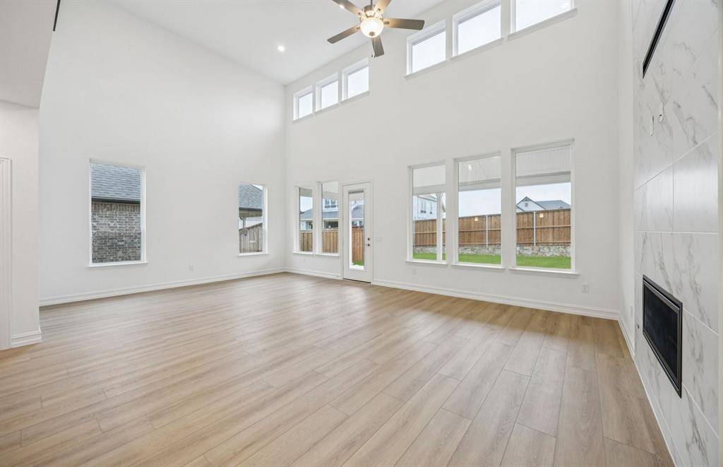*Floorplan representation, not actual home - Spacious gathering room with large windows *Floorplan representation, not actual home - Spacious gathering room with large windows