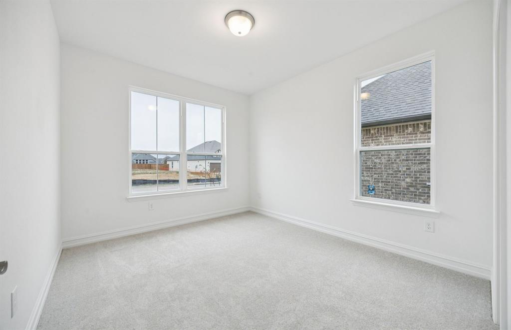 *Floorplan representation, not actual home - Spacious secondary bedroom with large windows