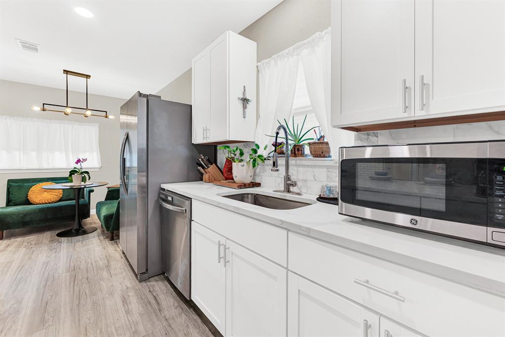 Enjoy gorgeous countertops, SS appliances, incl. vent